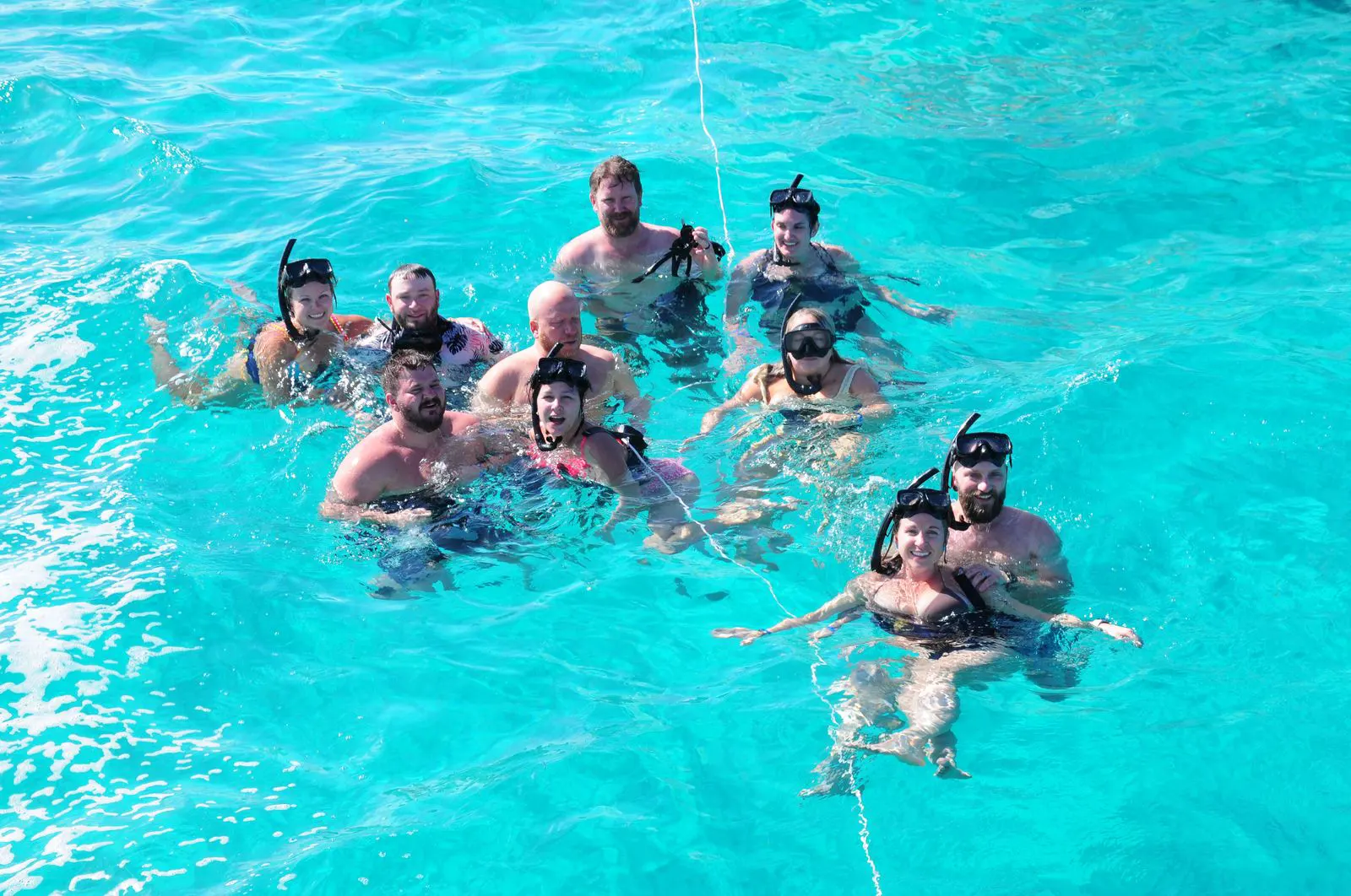 Safe swimming zone marked with flags on a beach in Punta Cana