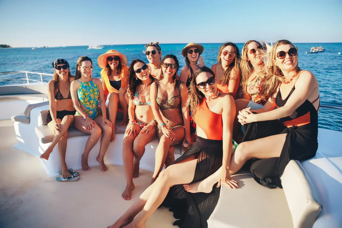 Friends enjoying the onboard setting for a Punta Cana boat celebration