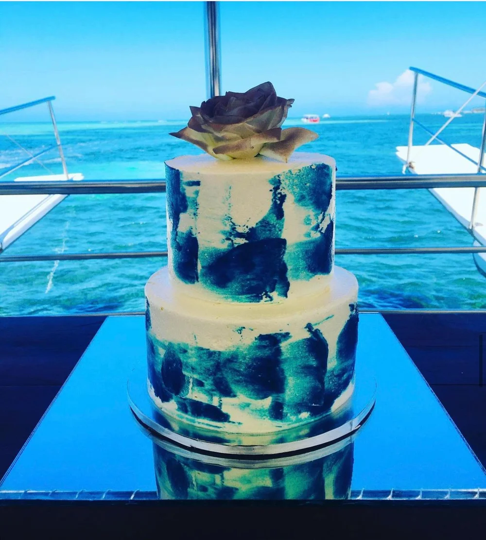 Decorated birthday cake aboard a boat