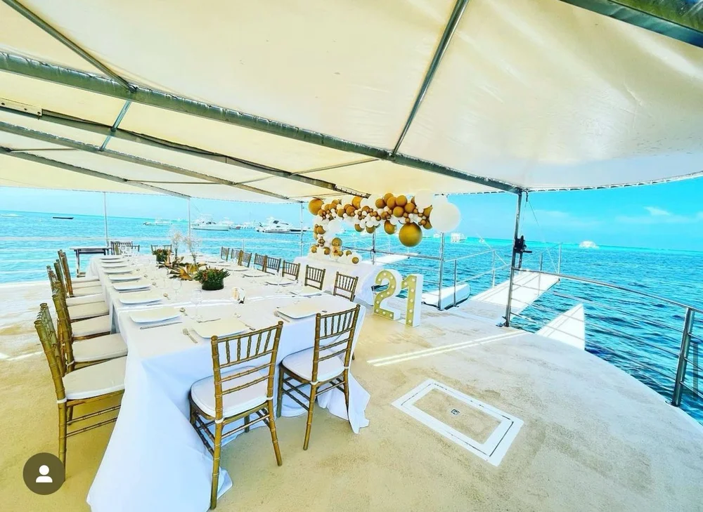 Decorated dining table aboard a catamaran