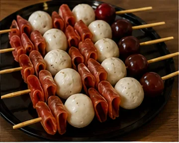 Mozzarella, serrano and cherries brochette
