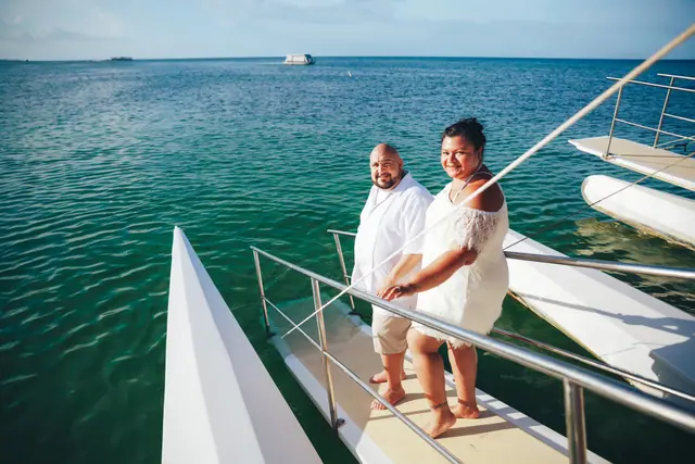 Local crew helping guests during a Punta Cana catamaran charter