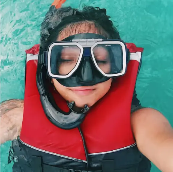 Guests snorkeling during a Punta Cana catamaran tour