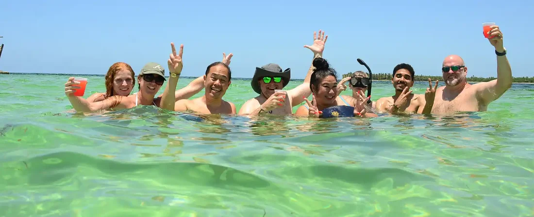 Friends enjoying the shallow water at the Natural Pool