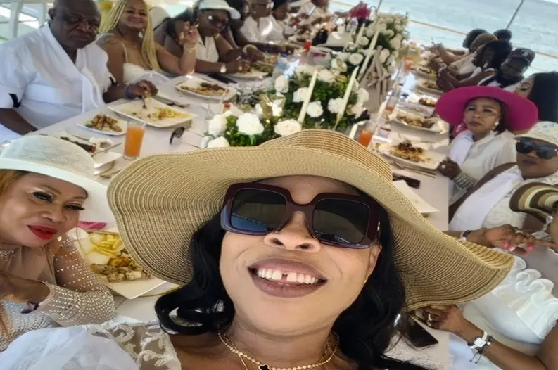 Group eating lunch on a boat party catamaran in Punta Cana
